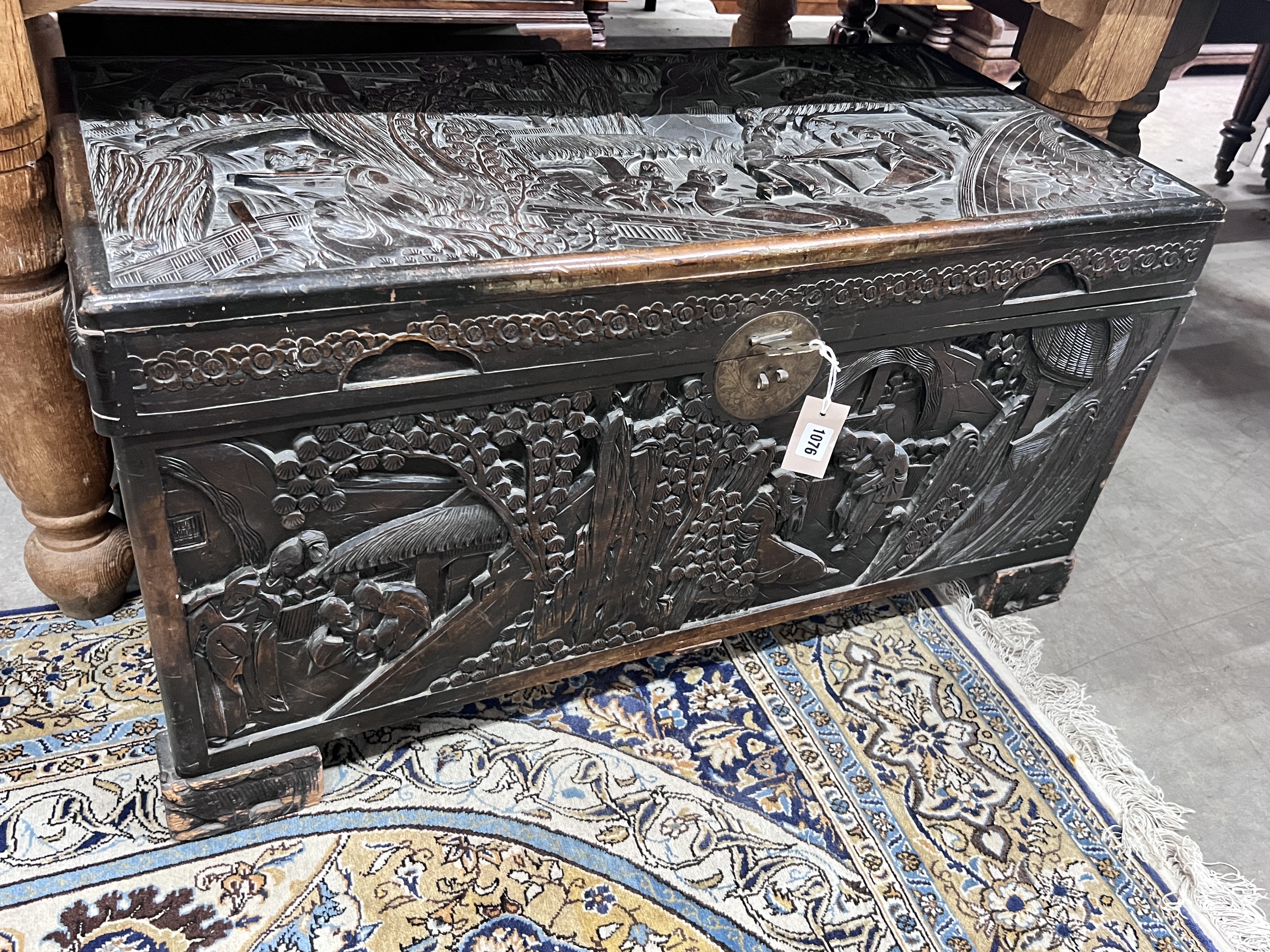 A Chinese carved camphorwood trunk, length 96cm, depth 48cm, height 50cm